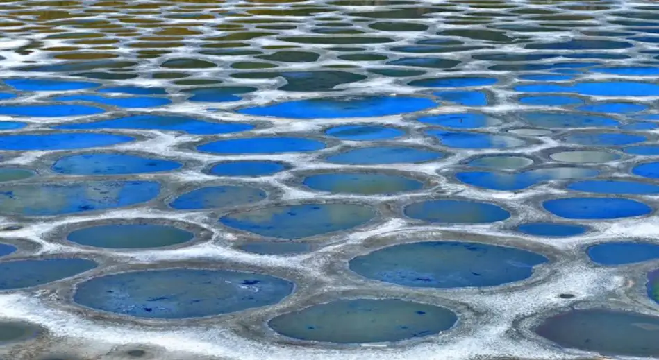 A Very Unusual Place To Visit On Earth Is Spotted Lake Khiluk, Puddles Of Water